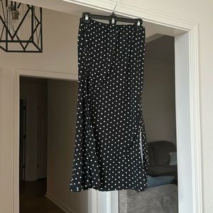 Polka dot skirt with slit and adjustable waist. Never worn